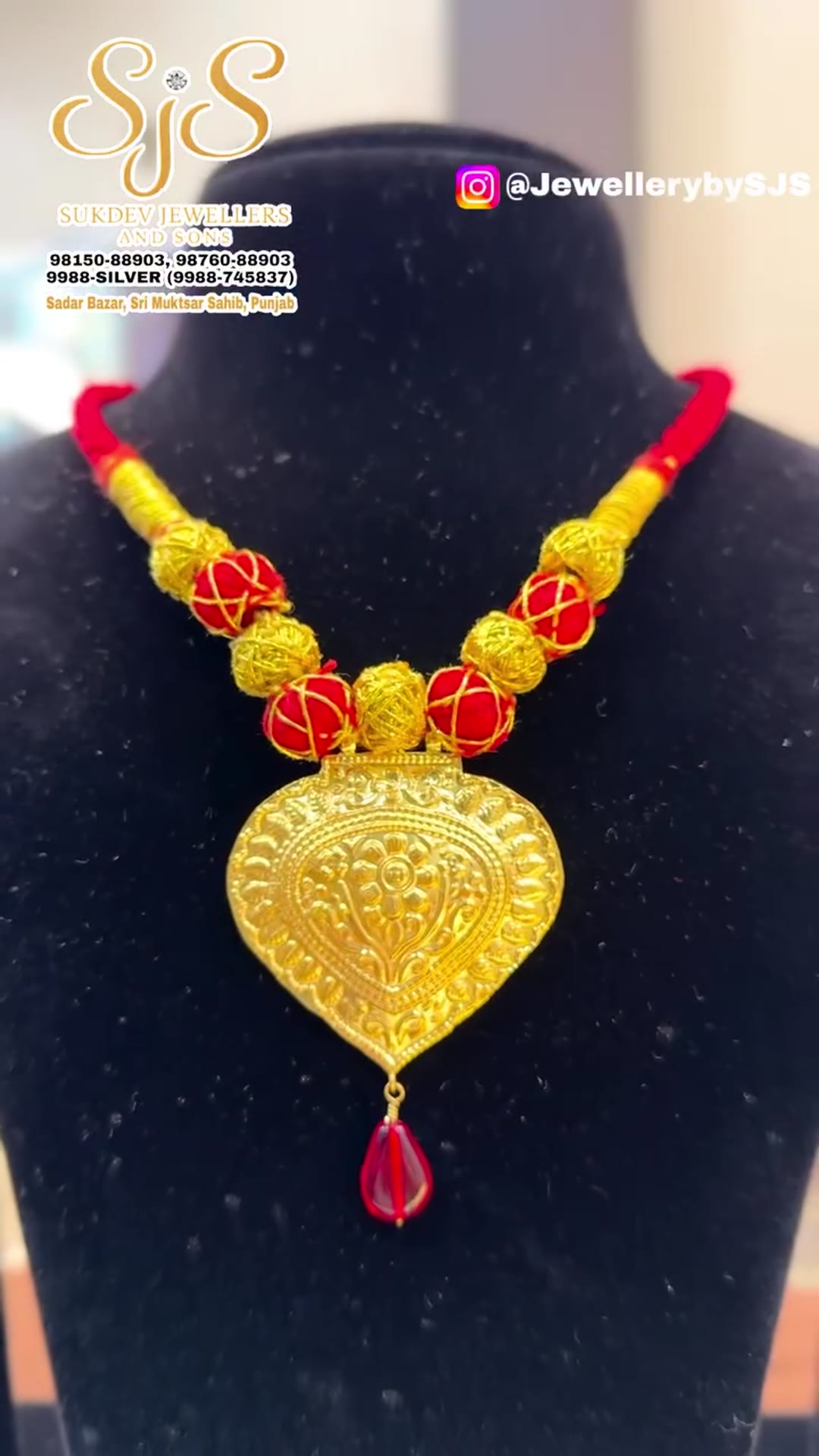 Gold kaintha with red beads
